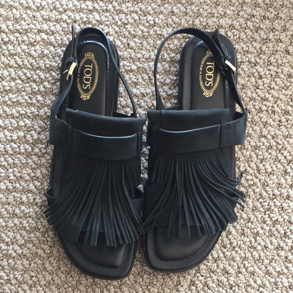 Tod’s black fringe sandals